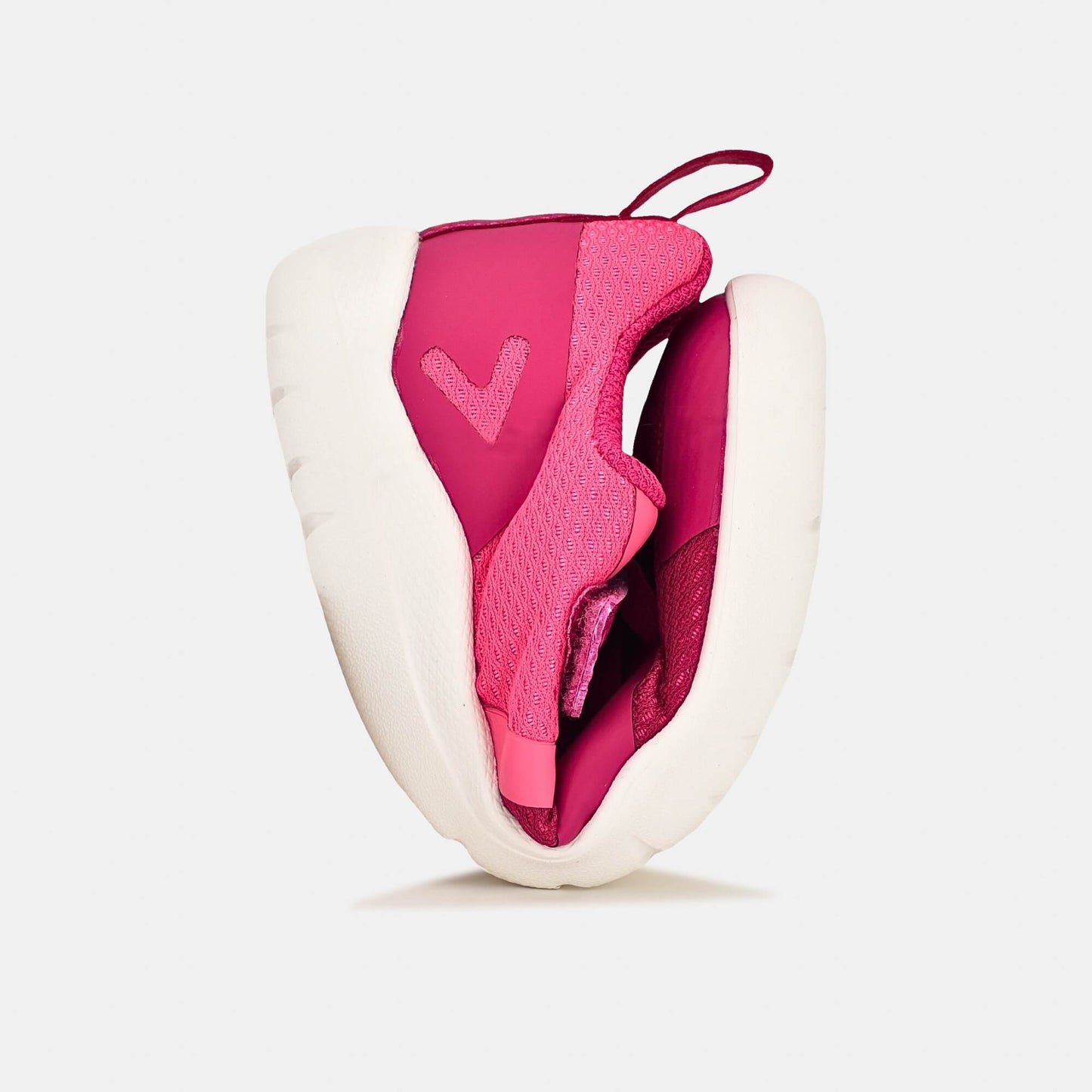 Pink barefoot kids trainer - flexed