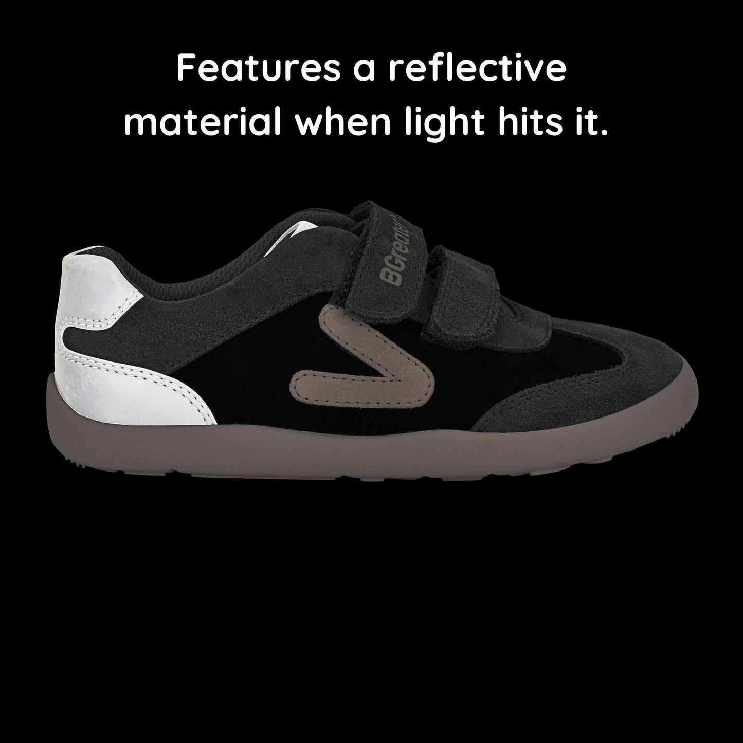 Kids Suede Velcro Trainer Black in the dark showing reflective material.