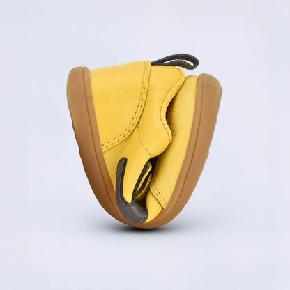 Ochre barefoot toddler trainer - flexed