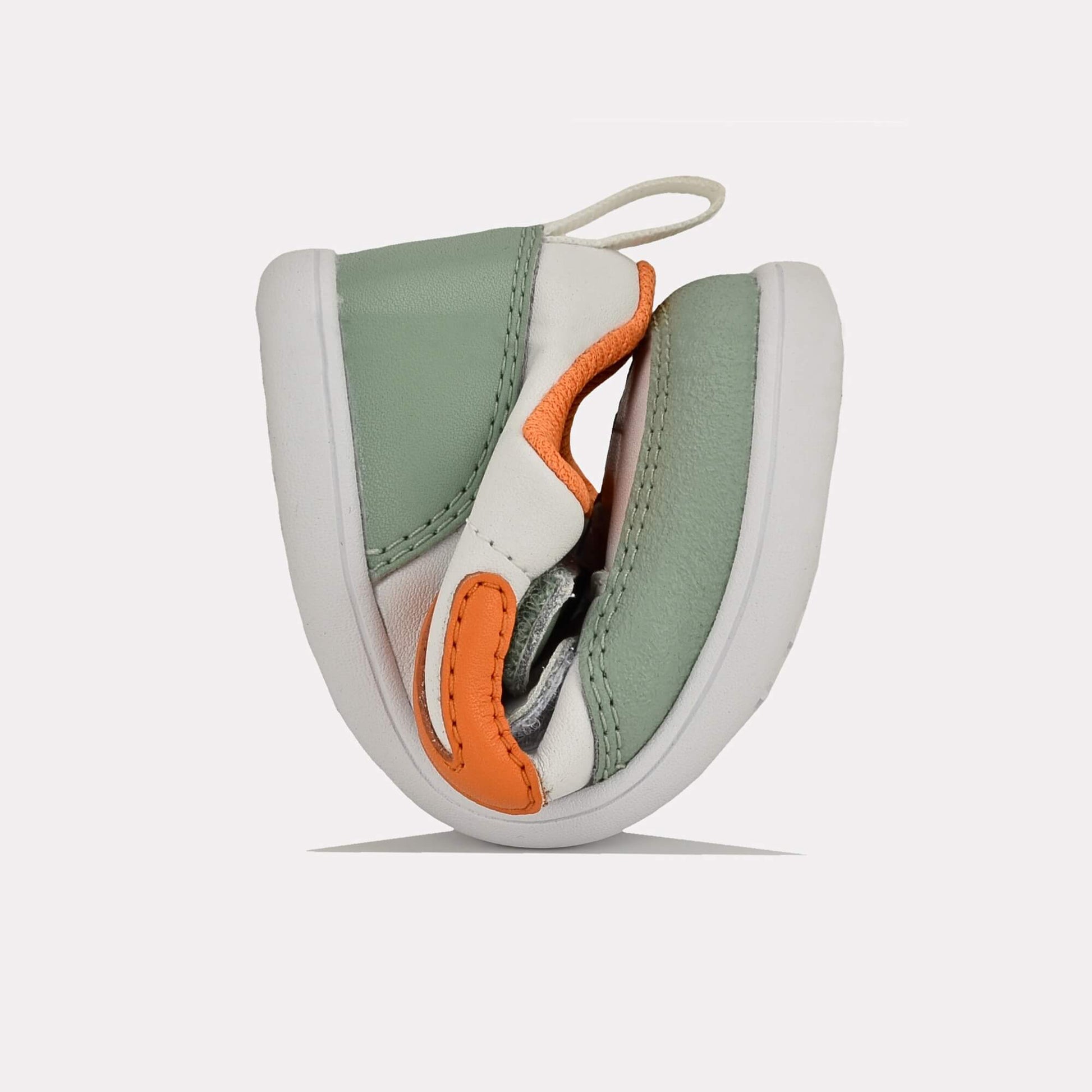 Olive white barefoot toddler trainer - flexed
