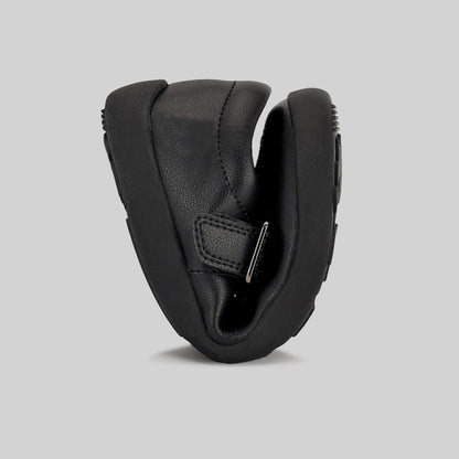 Matte black barefoot girls school shoe - flexed