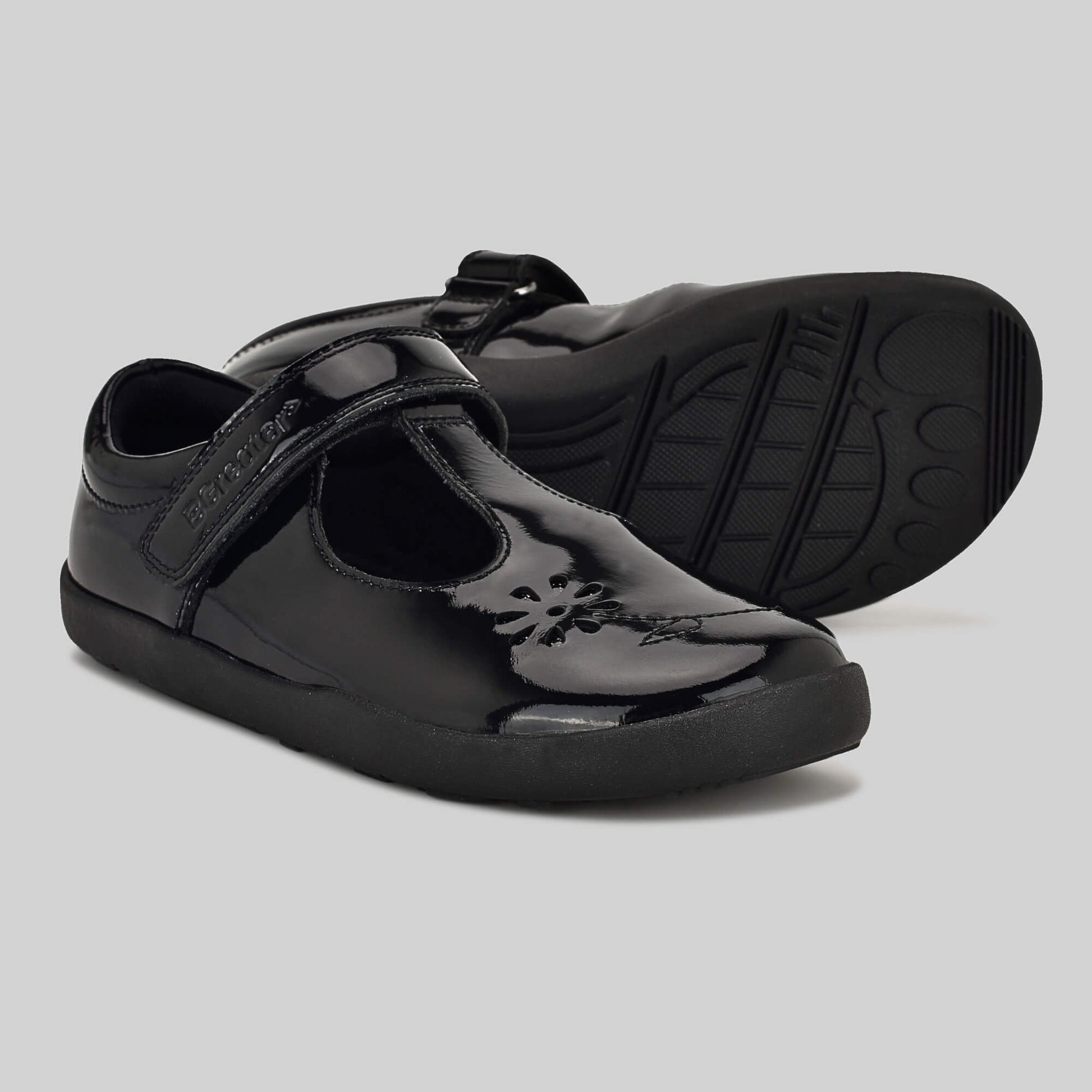 Patent black barefoot girls school shoe - pair with sole showing
